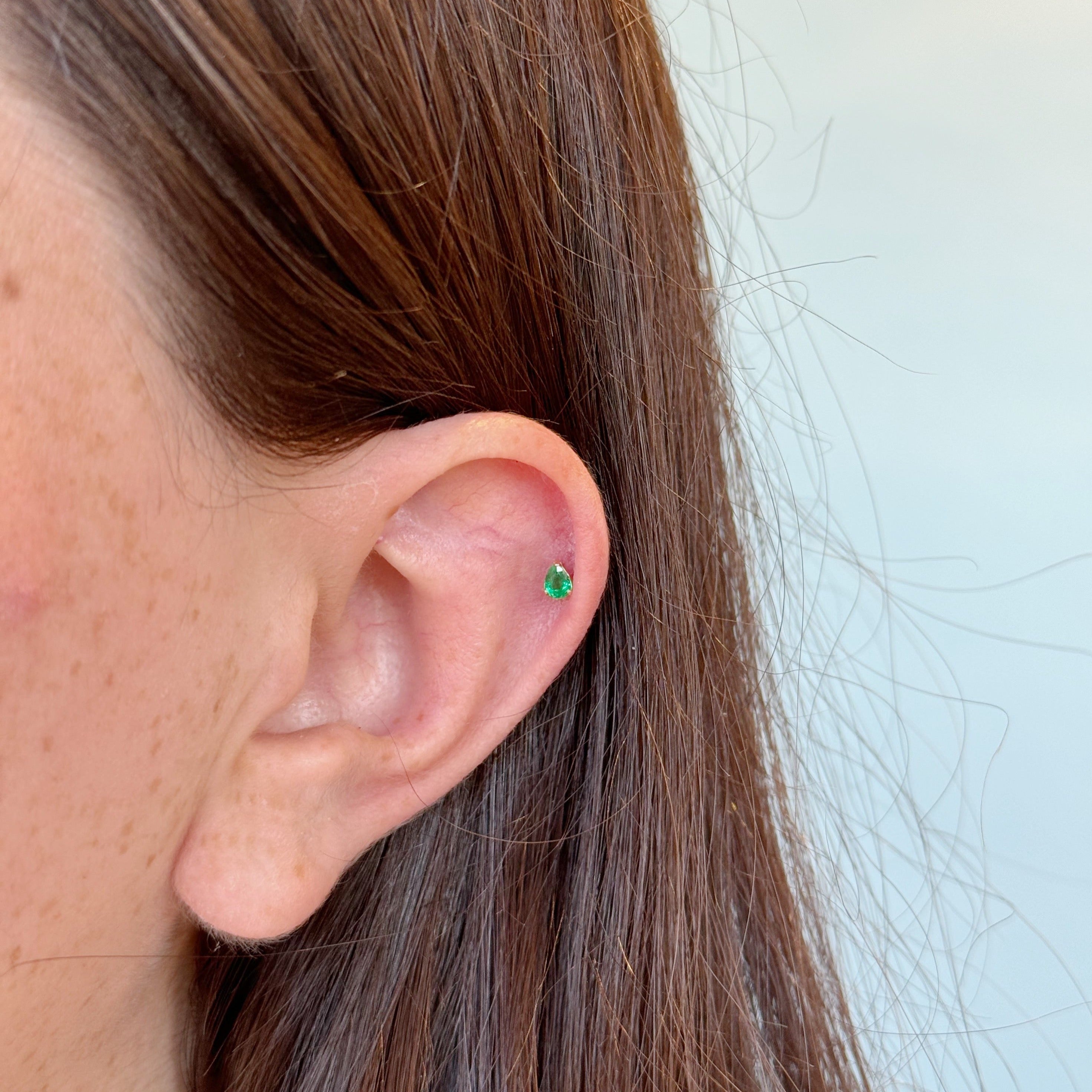 Kristen Emerald Piercings
